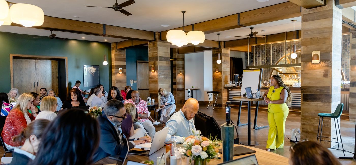 Image: 2025's The Biz Huddle meeting. (Photo Credit: Brio Photography)