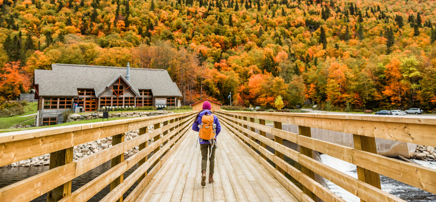 Image: Autumn nature hiker walking in national park in Quebec (Photo Credit: Courtesy AdobeStock)