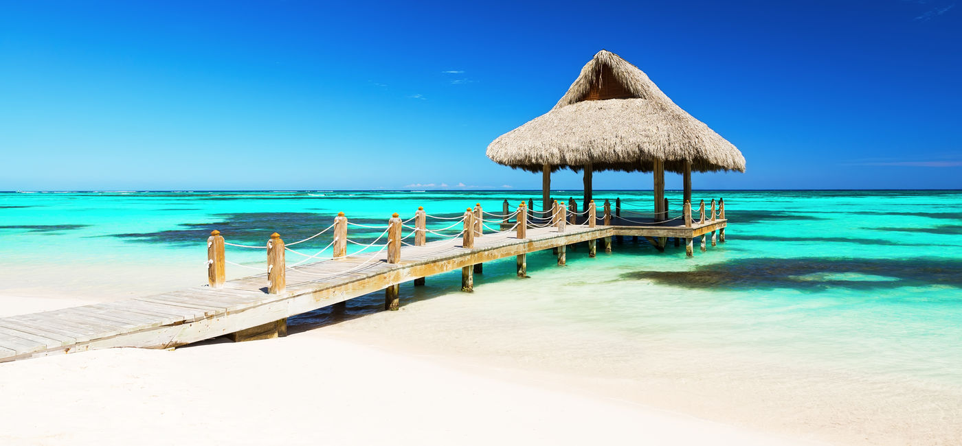 Image: Beautiful gazebo on the tropical white sandy beach in Punta Cana, Dominican Republic (Photo via  Preto_perola / iStock / Getty Images Plus)