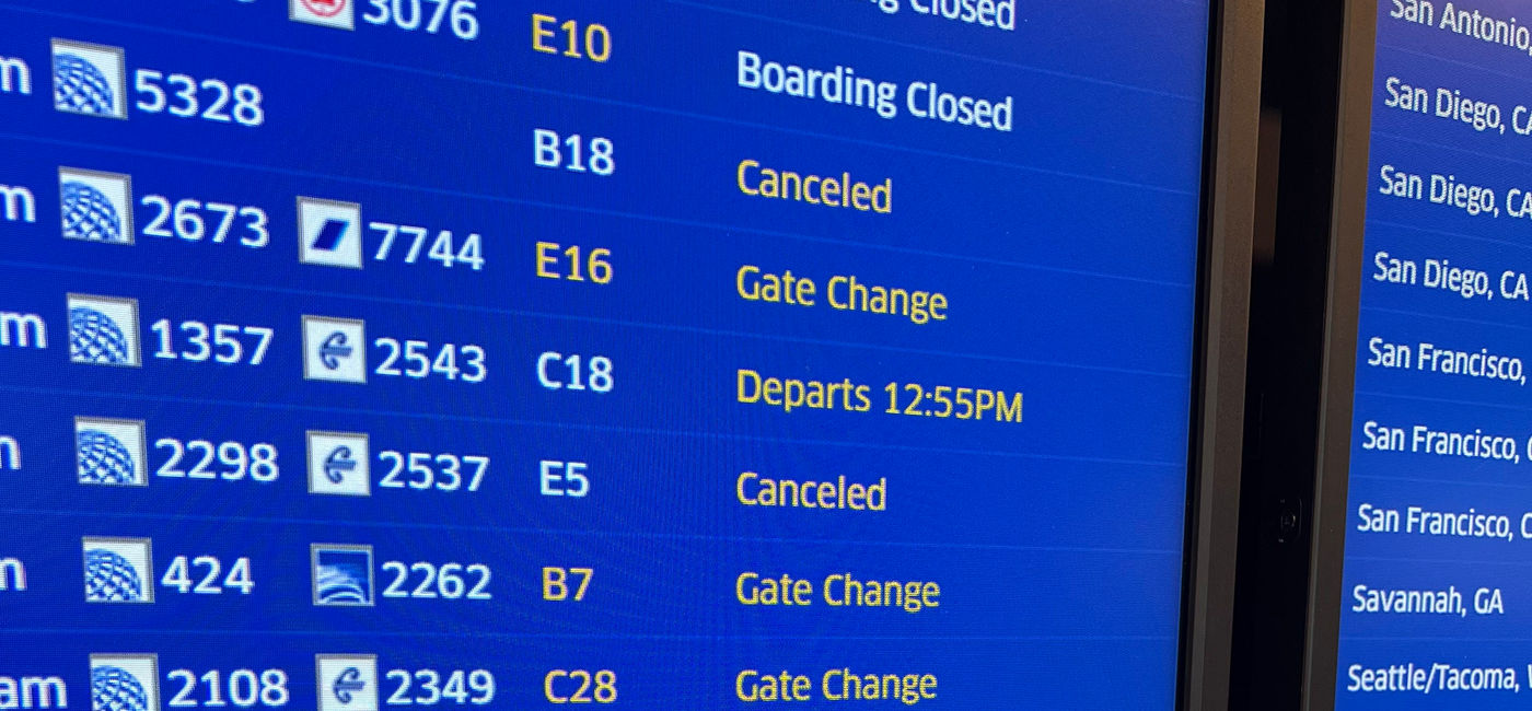Image: Flight delays on a board at Chicago's O'Hare International Airport. (Photo Credit: Photo by Paul J. Heney.)