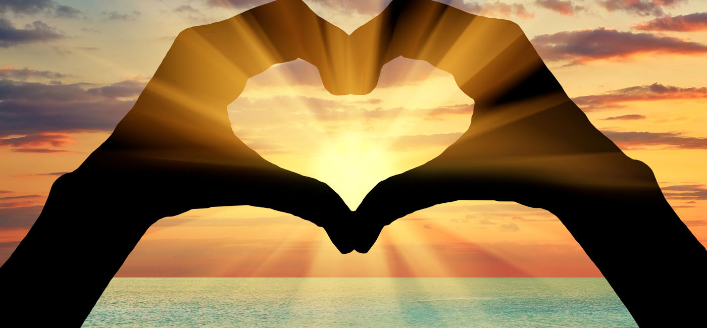 Image: Silhouette of the heart of gesture of hands (Photo Credit: Prazis Images / Adobe Stock)