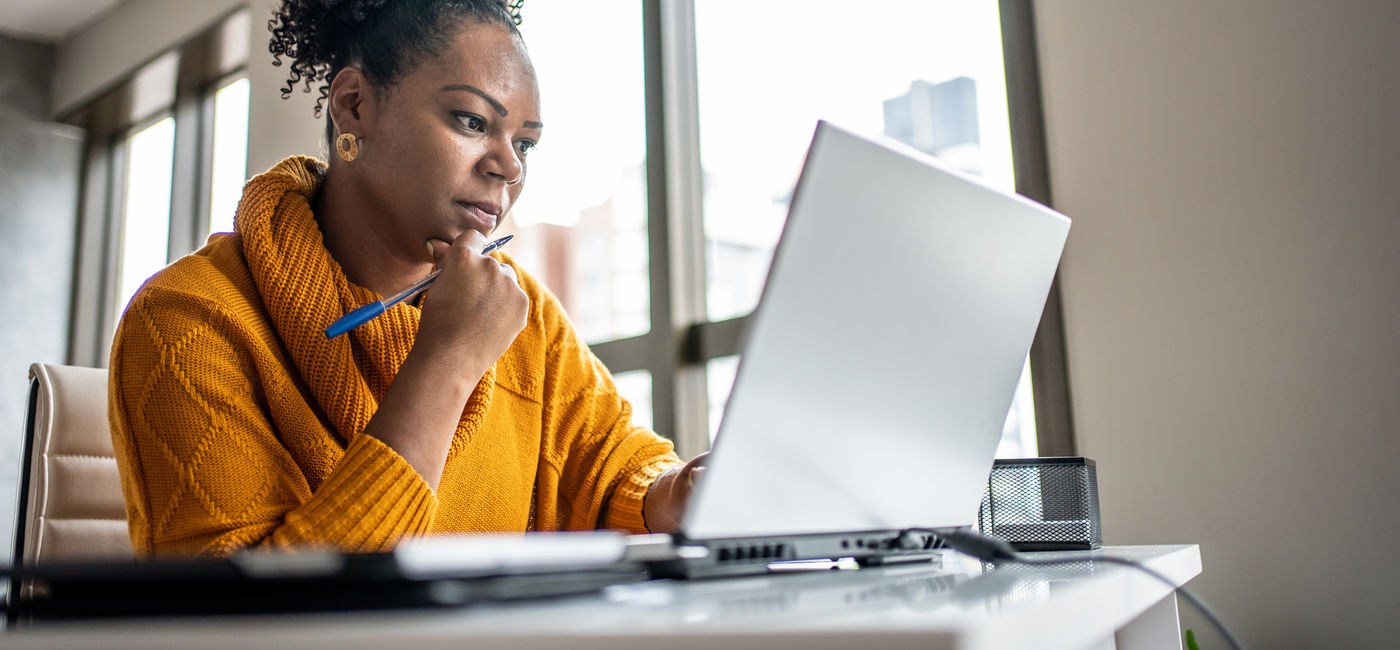 Image: Travel advisor working from the home office. (Photo Credit: Drs Producoes/E+)