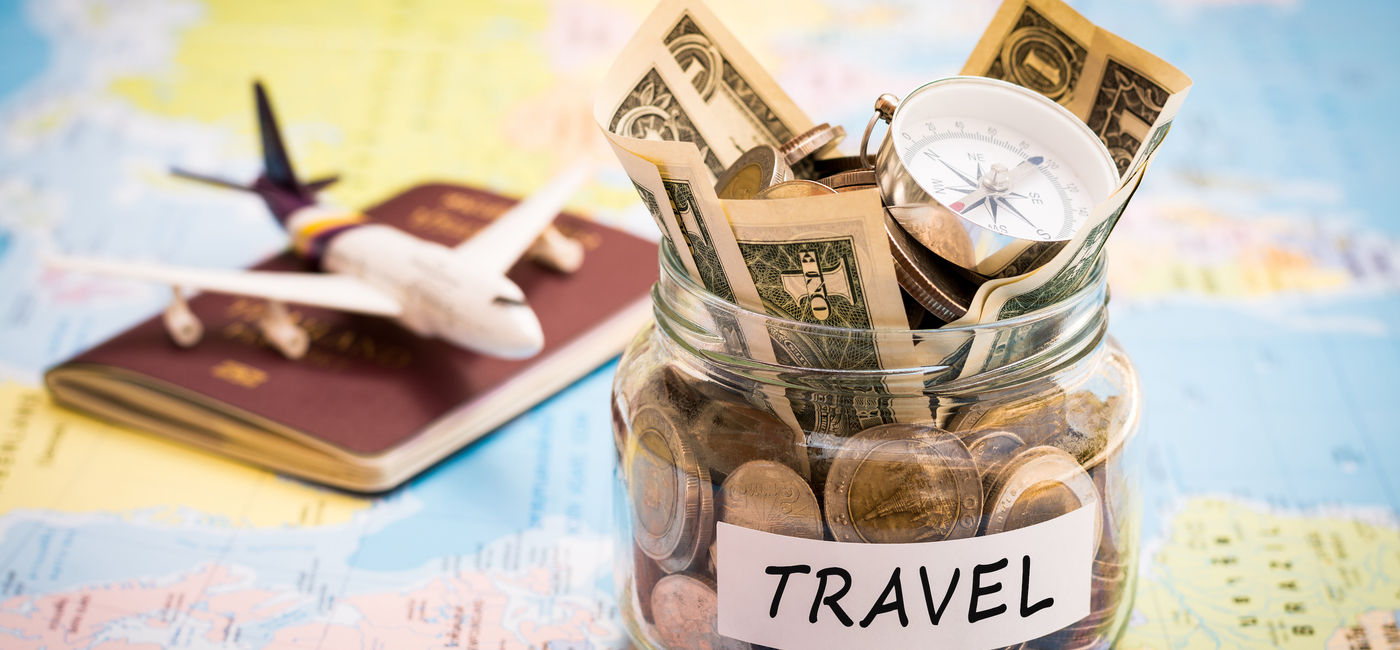 Image: Travel savings. (Photo Credit: Adobe Stock/surasaki)
