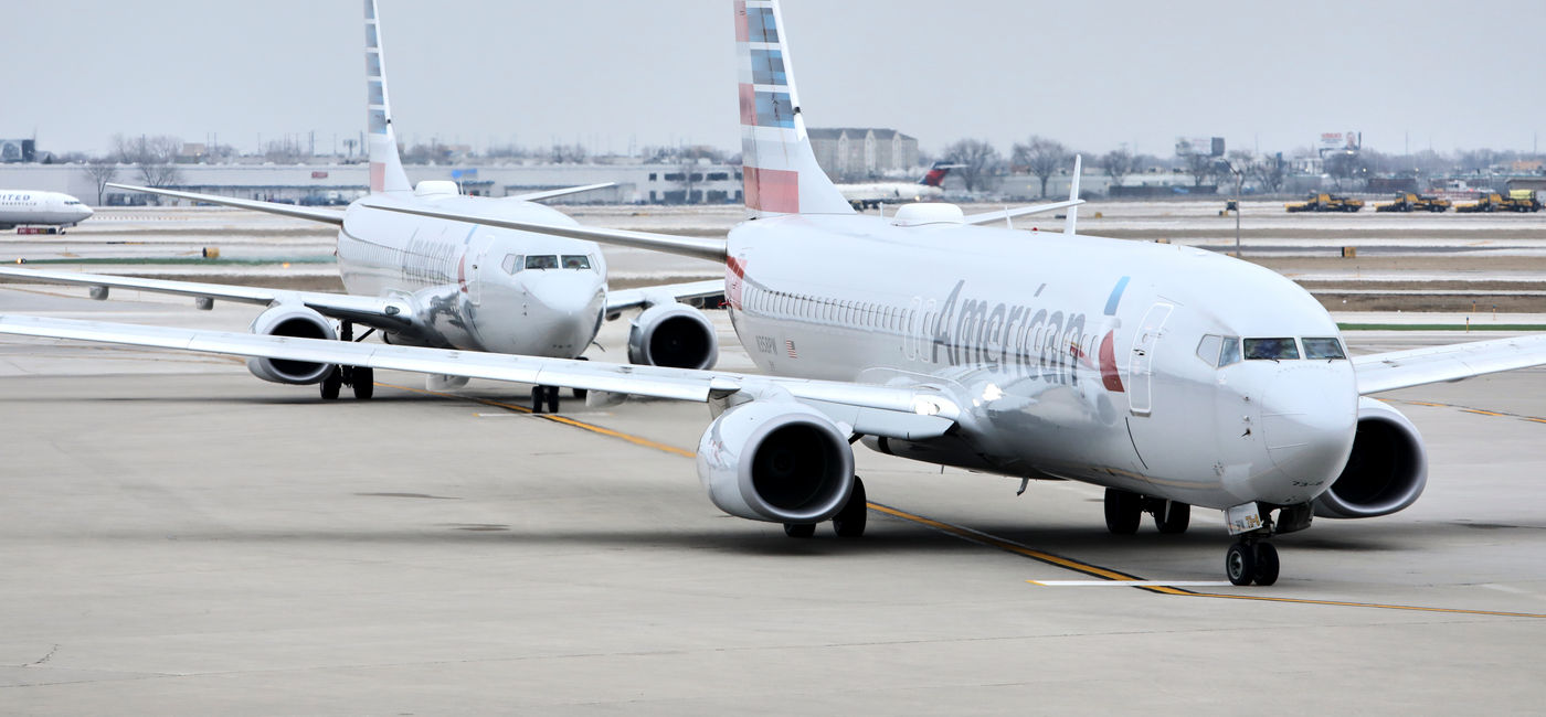 Image: Two American Airlines aircraft taxi on the runway. (Photo Credit: American Airlines)