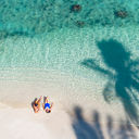 A couple at a lagoon on Moorea