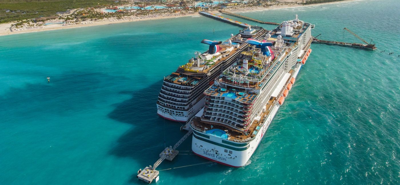 Photo: Mardi Gras and Carnival Pride dock at Celebration Key (Photo Credit: Carnival Cruise Line)