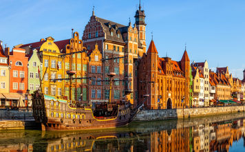 The riverside with the characteristic promenade of Gdansk, Poland. (Photo via nightman1965 / iStock / Getty Images Plus)