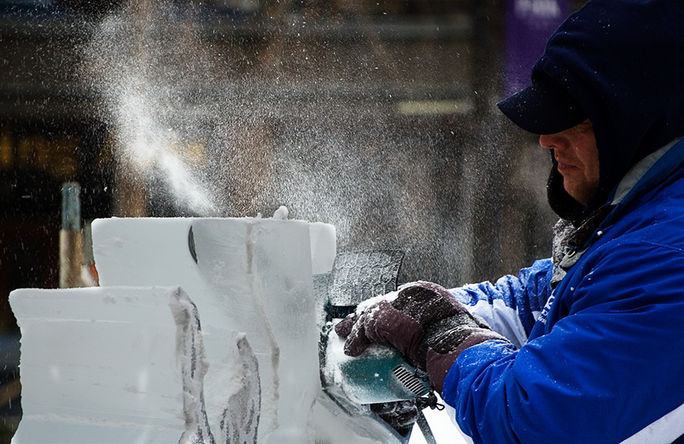 sculptor at work at the St. Paul Winter Carnival ice carving, St. Paul Winter Carnival