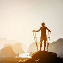 Hiker on crutches, protect your trip with travel insurance