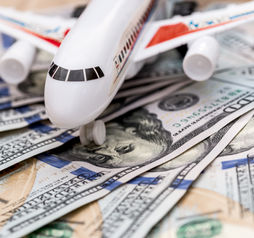 Airplane on dollar bills.
