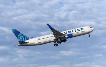 United Airlines airplane in flight.