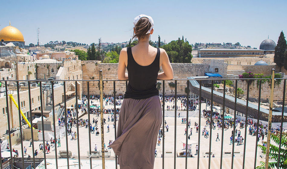Women looks on at Jerusalem old city, Israel