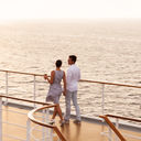 Couple walking on cruise ship deck