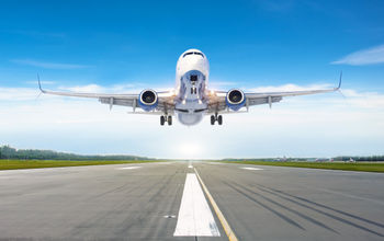 Passenger airplane landing on a runway.